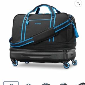 American Tourister Black and Blue Rolling Travel Bag